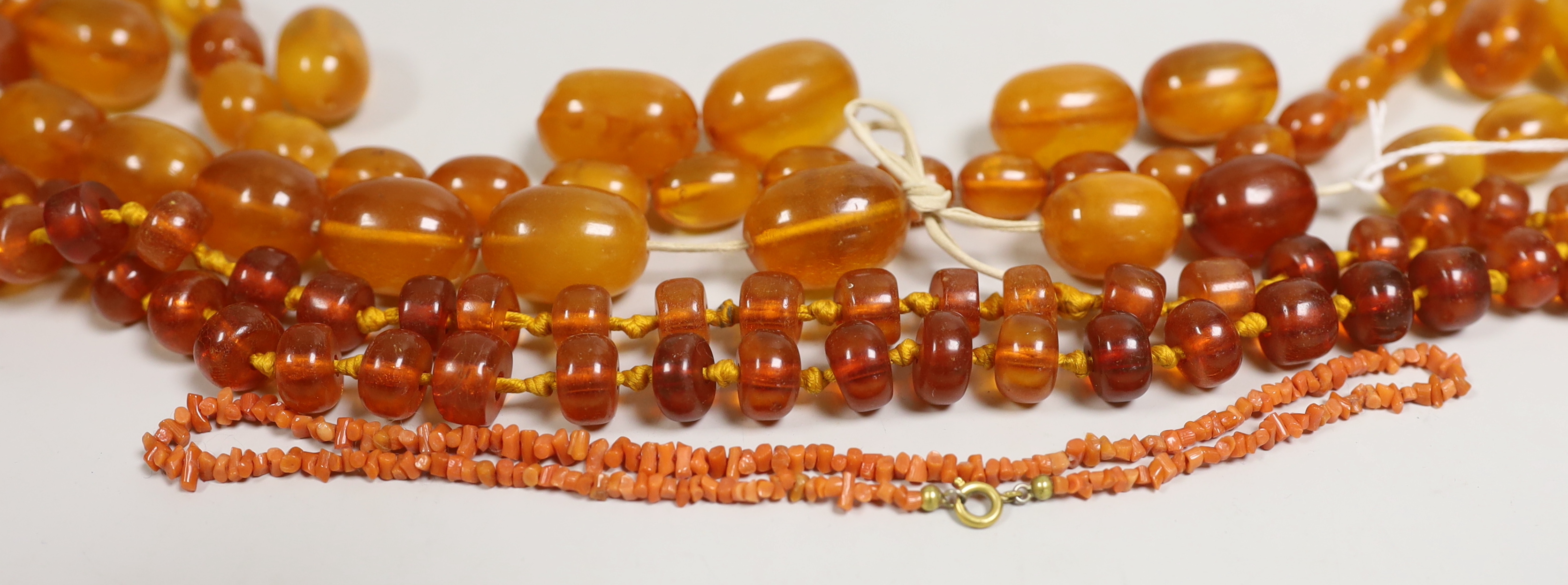 Assorted amber including necklaces.